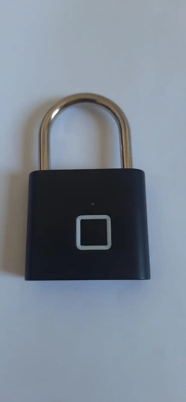 Buyer-submitted marketplace review photo showing the O11 fingerprint padlock in real-world use
